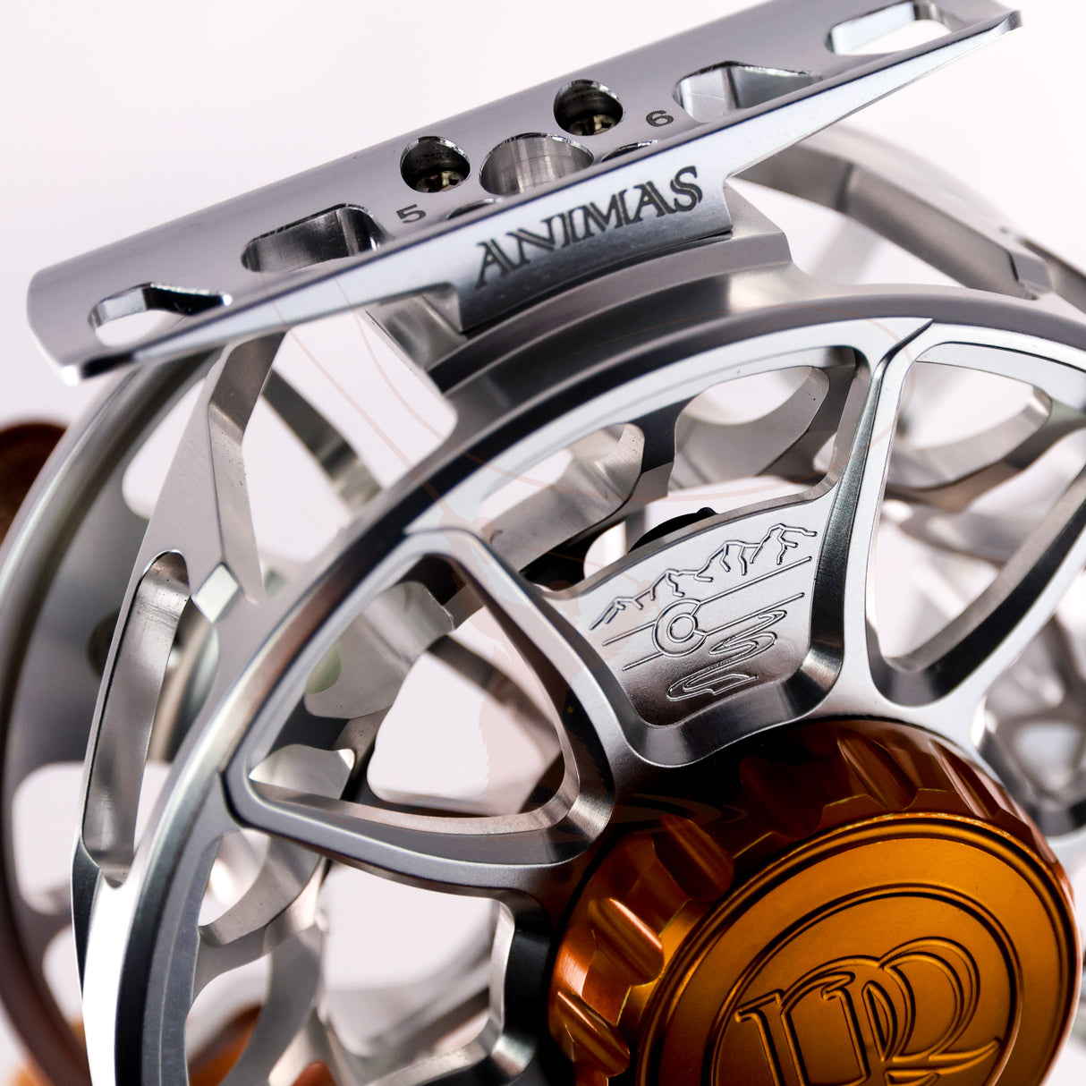 Used Ross Animas 5-6 fly fishing reel in platinum