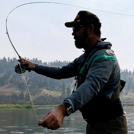 Man casting a fly fishing rod