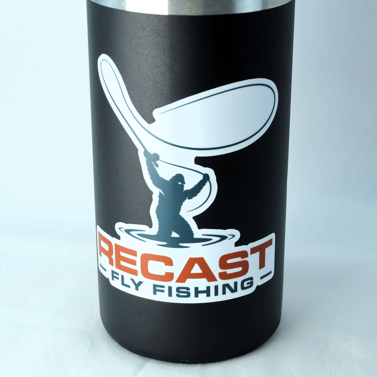 Close up of insulated water bottle with Recast Fly Fishing logo sticker on it