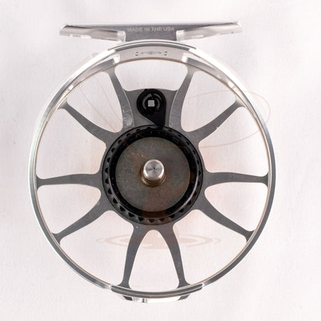 Used Ross Animas 5-6 fly fishing reel in platinum